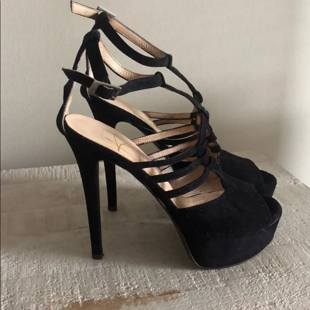 Abel Muñoz Eiffel Platform Sandals